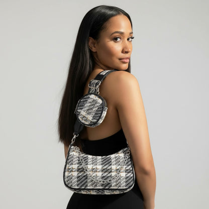 Omayra Boutique tweed plaid shoulder bag with matching mini AirPod pouch and chain detail worn by a woman.