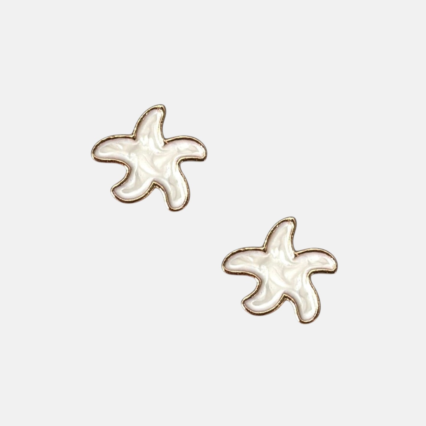 Omayra Boutique small white starfish stud earrings with gold trim, 1/2-inch, coastal bohemian style.