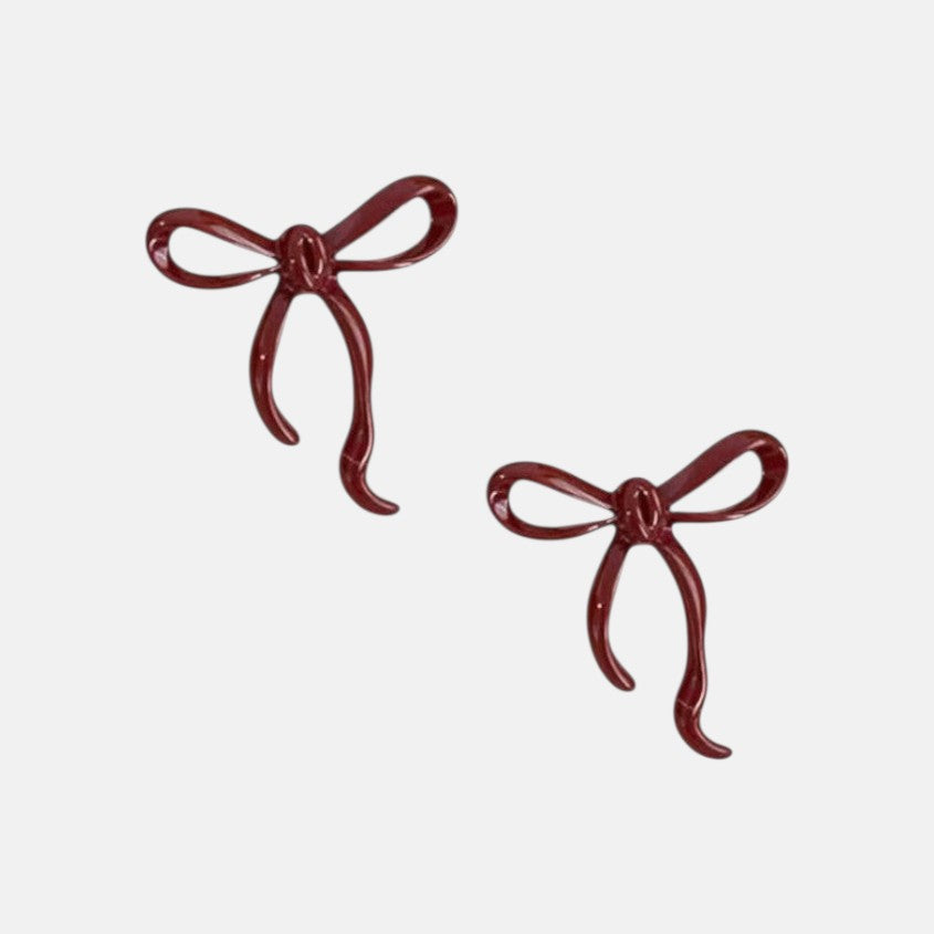 Omayra Boutique burgundy bowknot stud earrings made of zinc alloy, 1 inch long.