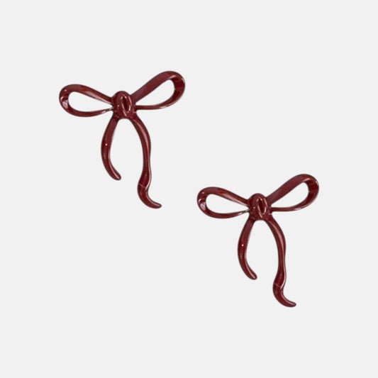 Omayra Boutique burgundy bowknot stud earrings made of zinc alloy, 1 inch long.