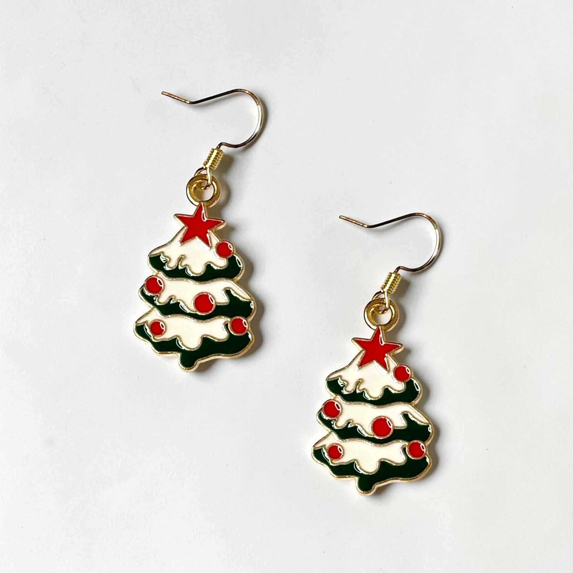 Omayra Boutique Christmas tree drop earrings with red star and baubles, white and green enamel.