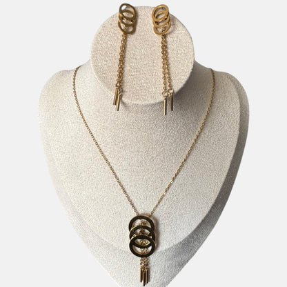 Omayra Boutique gold metal-alloy jewelry set with triple circle pendant necklace and matching drop earrings.