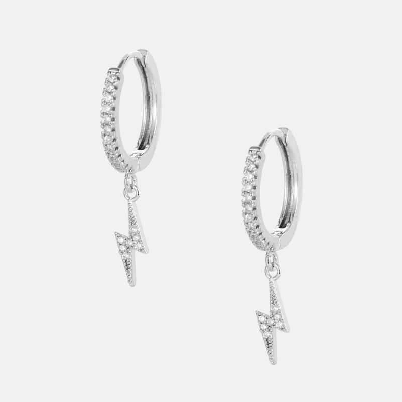 Omayra Boutique silver-tone hoop earrings with crystal lightning bolt charms. Modern, elegant design.