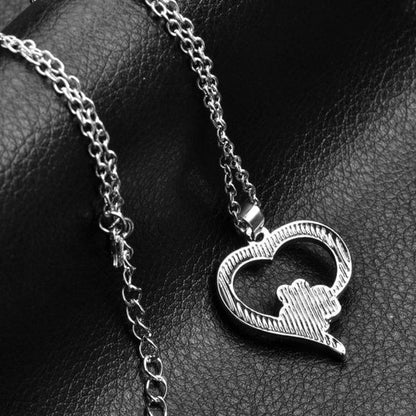 Collar con dije de pata y corazón para mujer