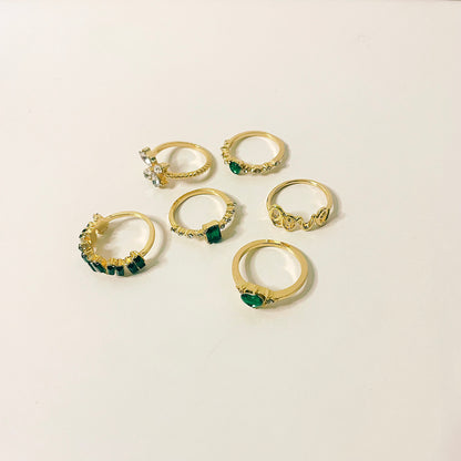Juego de 6 anillos en oro y verde esmeralda
