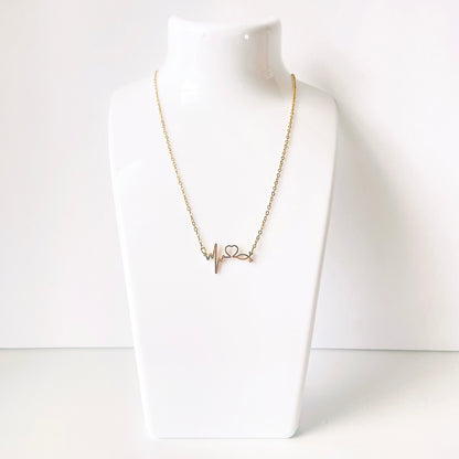 Collar con latido del corazón y estetoscopio